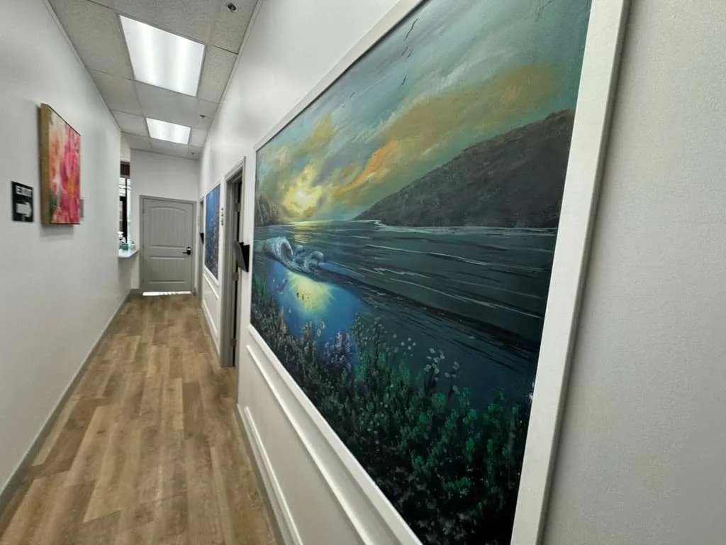 Palm Urgent Care hallway with artwork in San Diego clinic